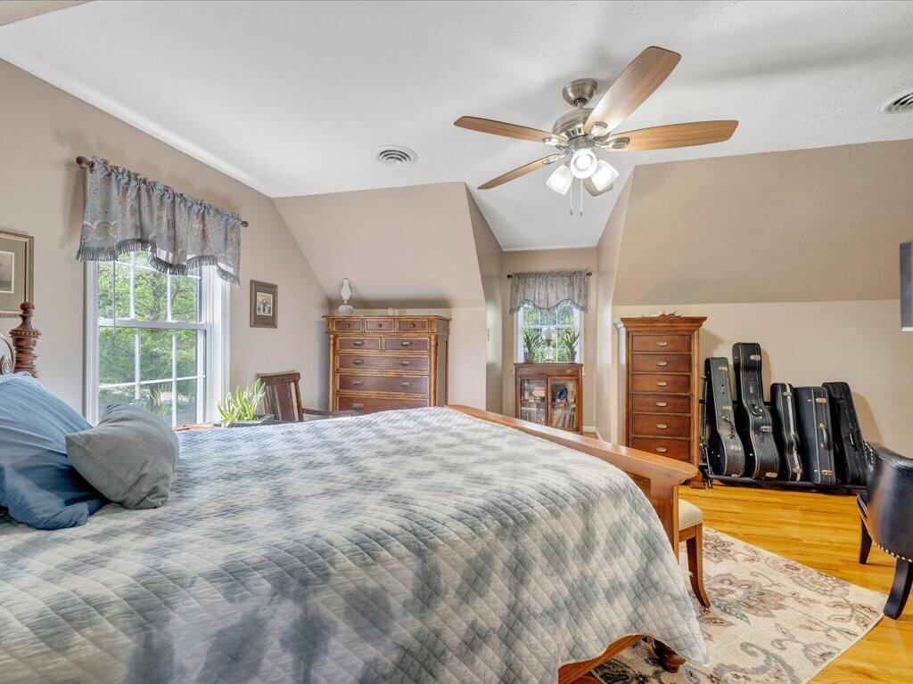 3475 Blue Knob Road Martinsville, VA 24112 - Photo 25 of 80 a bedroom with a bed and a large window