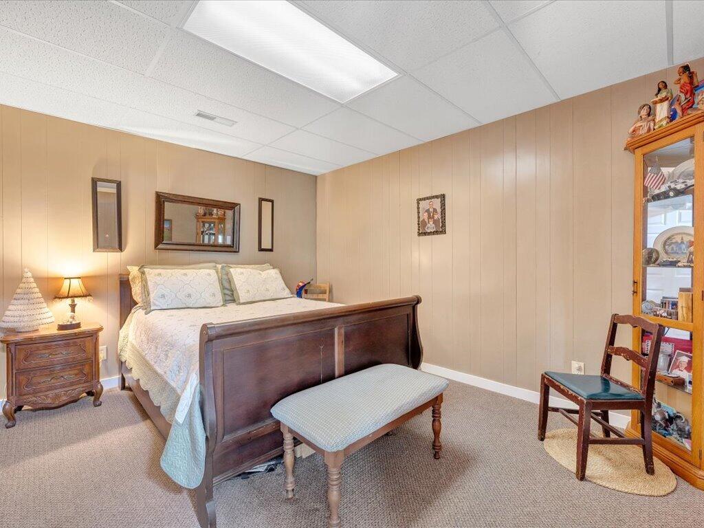 3475 Blue Knob Road Martinsville, VA 24112 - Photo 33 of 80 a bedroom with a bed and a chair