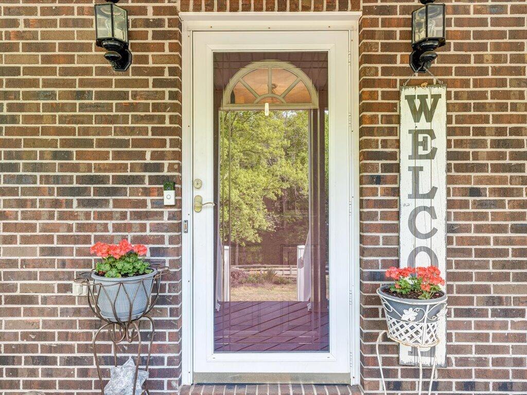 3475 Blue Knob Road Martinsville, VA 24112 - Photo 4 of 80 a front view of a house with a potted plant