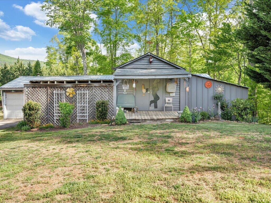 3475 Blue Knob Road Martinsville, VA 24112 - Photo 46 of 80 a front view of a house with garden