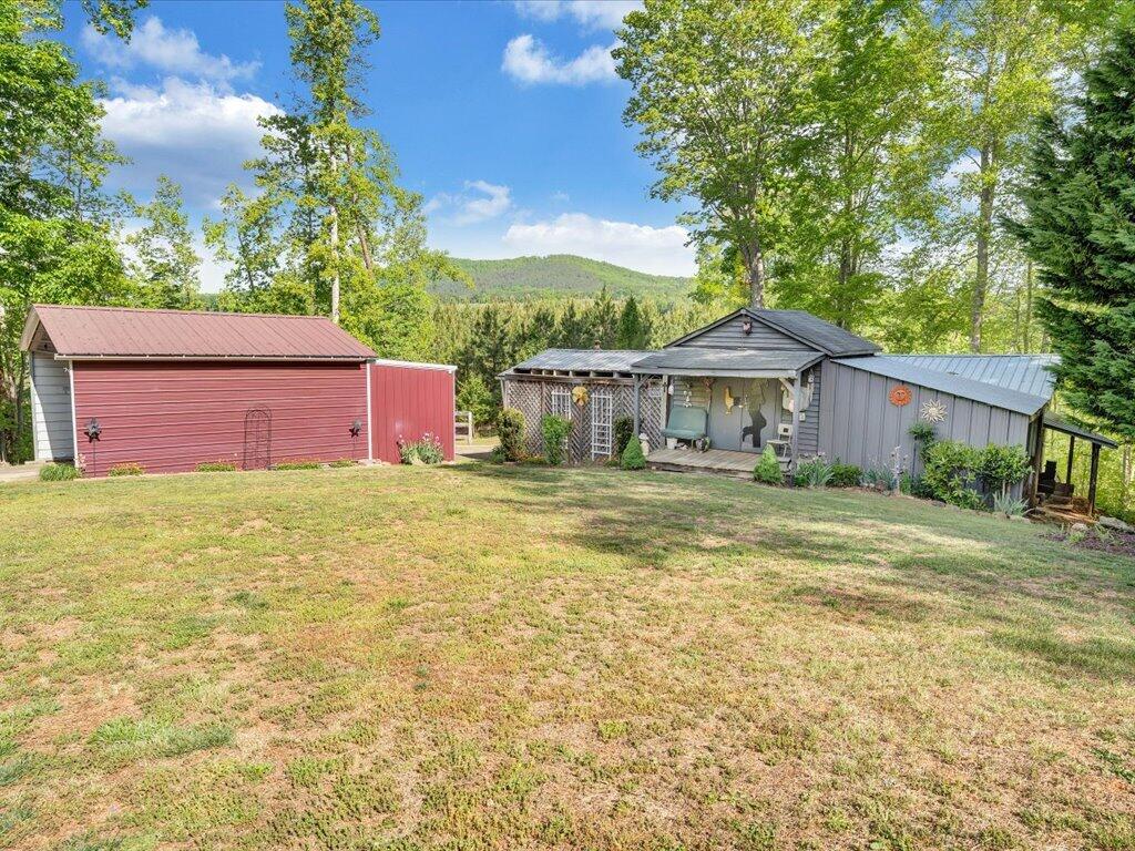 3475 Blue Knob Road Martinsville, VA 24112 - Photo 47 of 80 a front view of a house with a garden