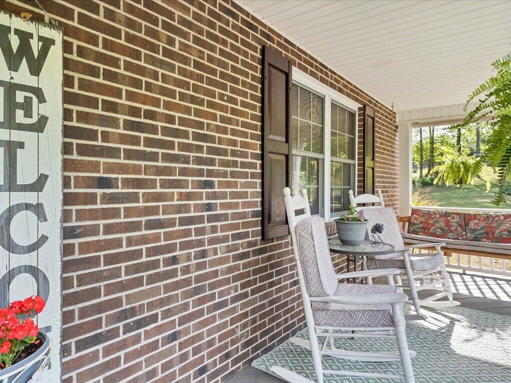 3475 Blue Knob Road Martinsville, VA 24112 - Photo 5 of 80 a view of a room with wooden floor and outdoor seating