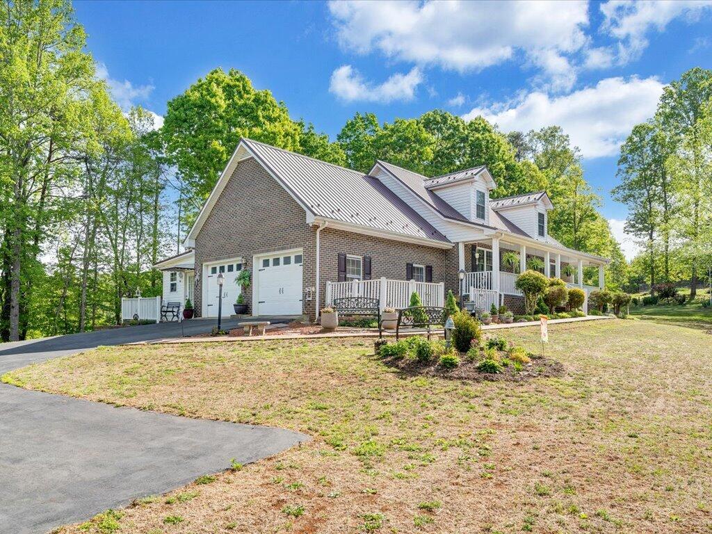 3475 Blue Knob Road Martinsville, VA 24112 - Photo 55 of 80 a front view of house with yard outdoor seating and green space