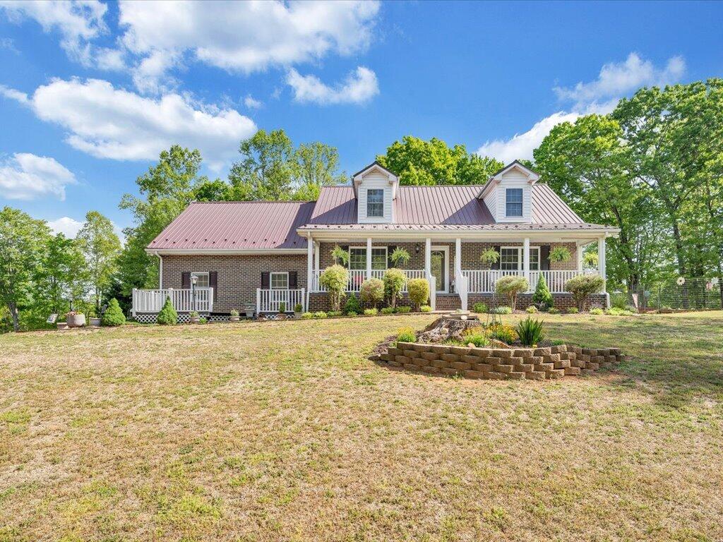 3475 Blue Knob Road Martinsville, VA 24112 - Photo 58 of 80 a front view of a house with a garden