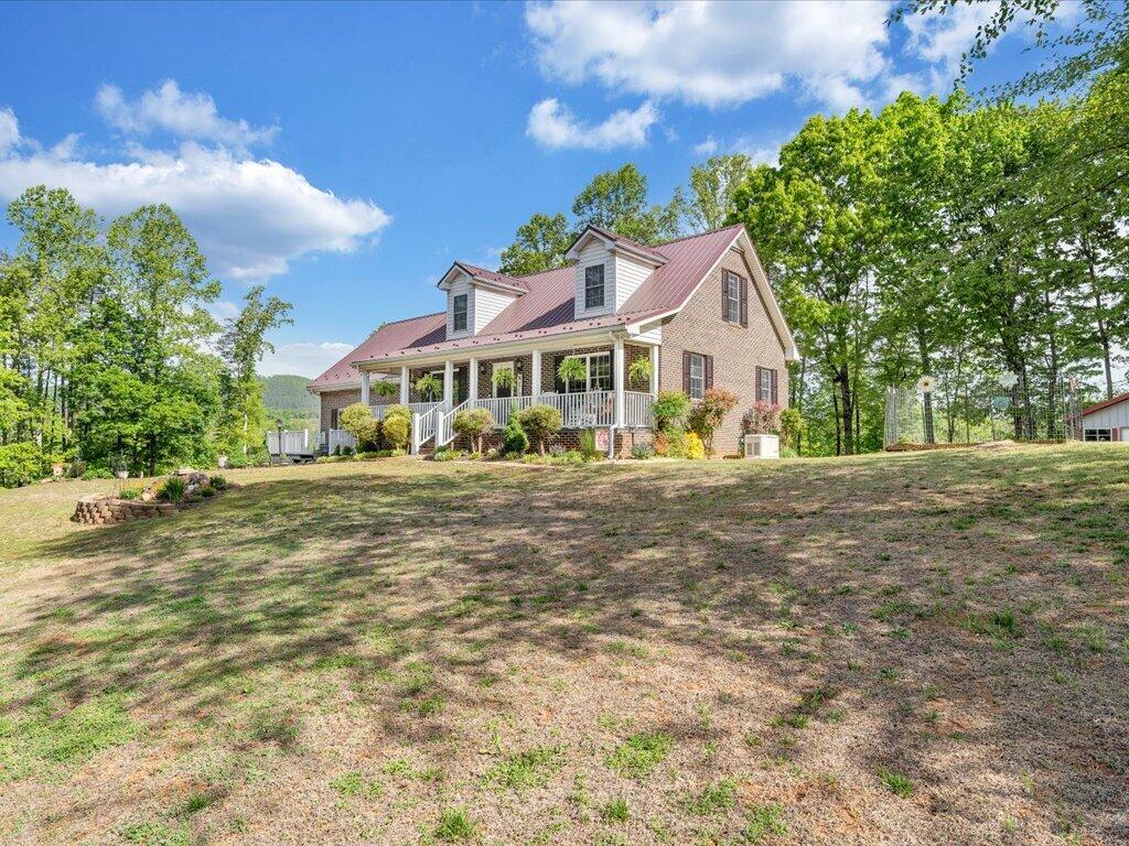 3475 Blue Knob Road Martinsville, VA 24112 - Photo 60 of 80 a front view of a house with a yard