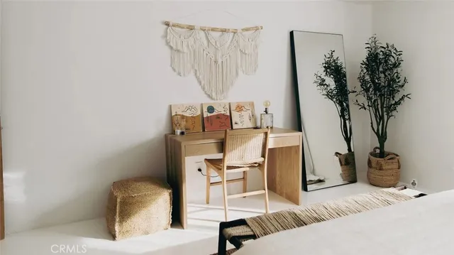 a bedroom with a bed and a closet