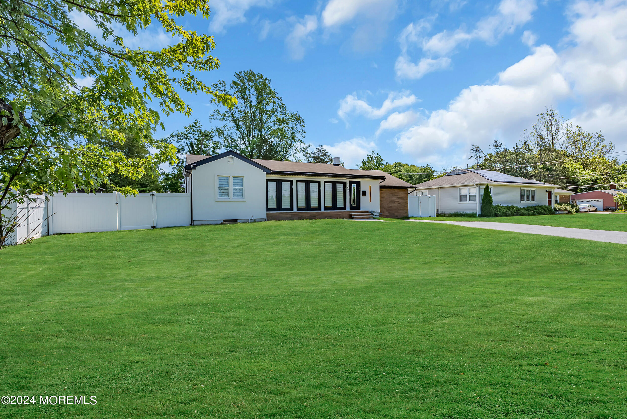 142 Locust Avenue West Long Branch, NJ 07764 - Photo 33 of 35 a view of a house with a yard