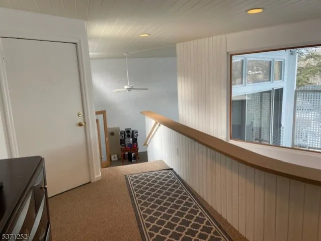 a swimming pool with outdoor seating