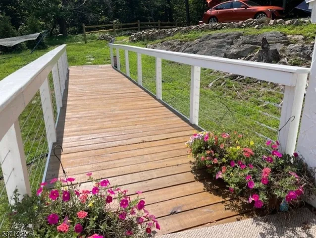 a living room with furniture gym and window