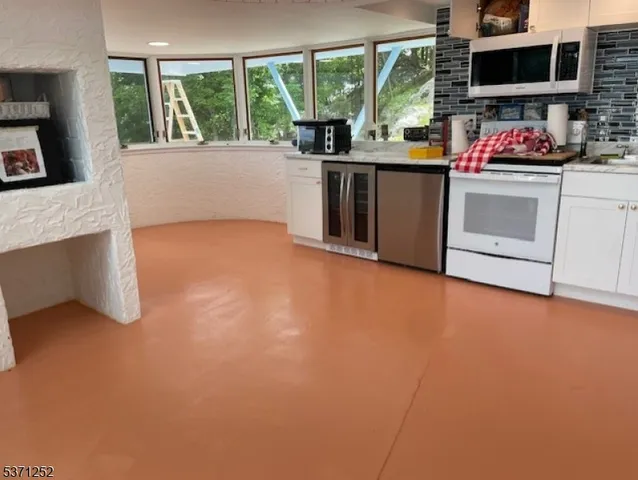 a view of a yard with trees