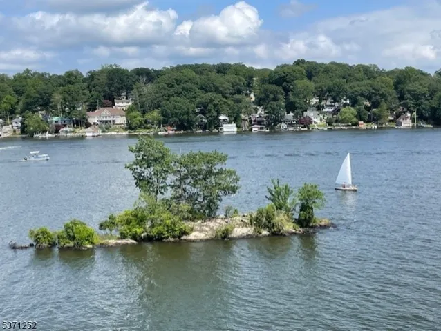an aerial view of a garden with an outdoor seating