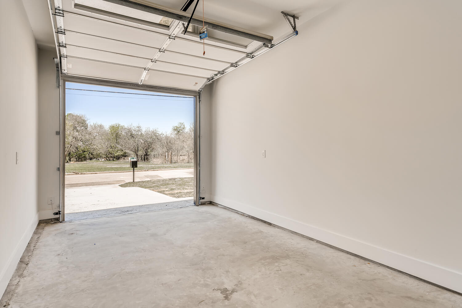 505 Kemp Street Austin, TX 78741 - Photo 23 of 34 Attached garage for parking, storage, bikes, gear, and all the extra stuff.
