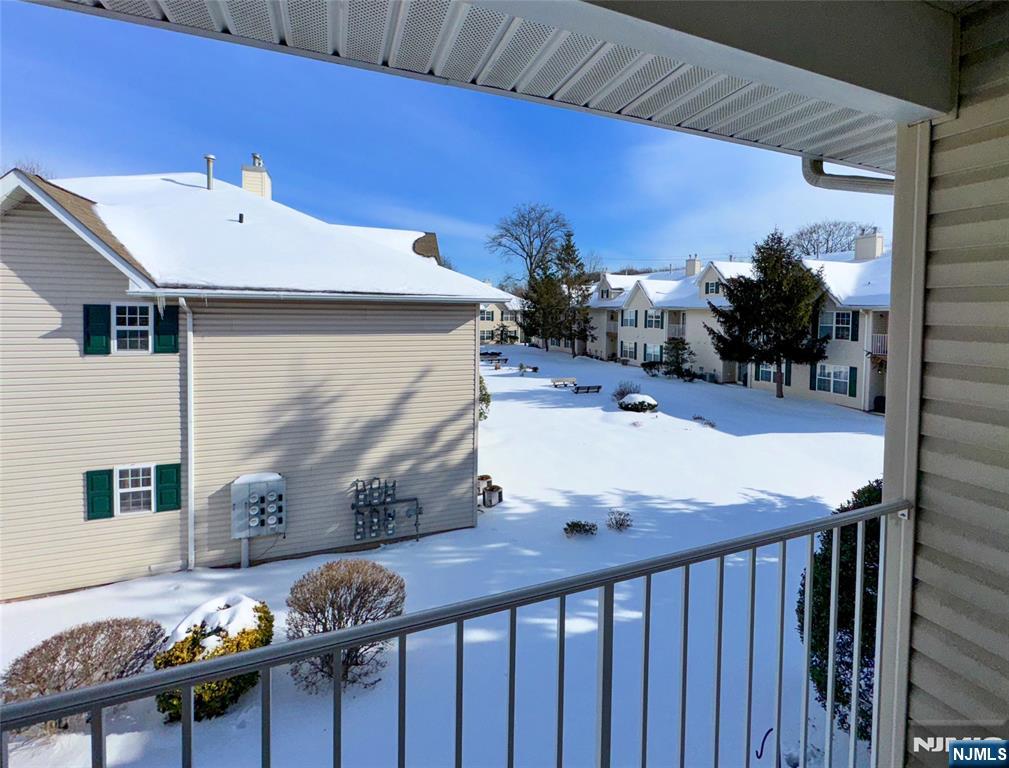 34 Chanda Court, Unit D034 Clifton, NJ 07012 - Photo 16 of 24 a view of a balcony with furniture and lamp