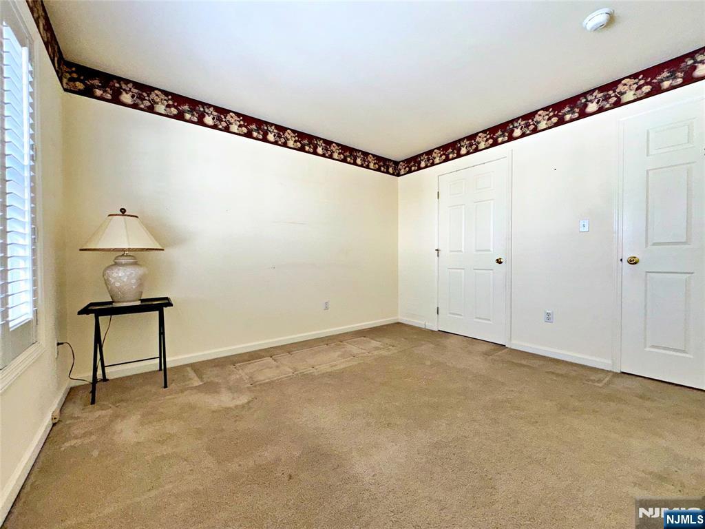 34 Chanda Court, Unit D034 Clifton, NJ 07012 - Photo 20 of 24 a view of an empty room