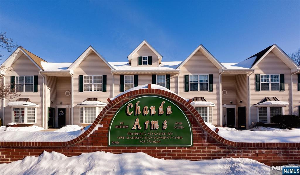 34 Chanda Court, Unit D034 Clifton, NJ 07012 - Photo 2 of 24 a front view of a house with garden