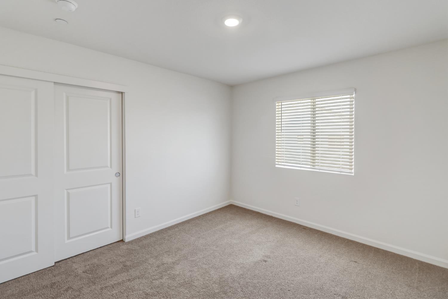 2887 Krone Way Antelope, CA 95843 - Photo 27 of 46 an empty room with windows