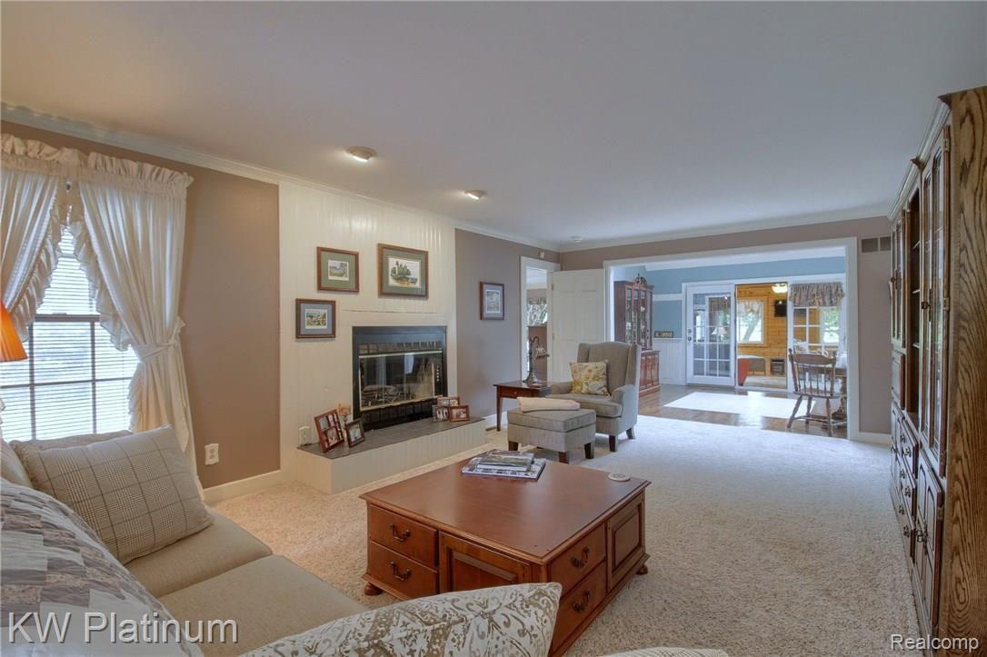 917 Brewer Road Leonard, MI 48367 - Photo 12 of 59 Living_Room_2nd_View.jpg