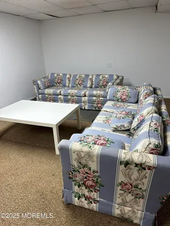 a view of a terrace with sitting area