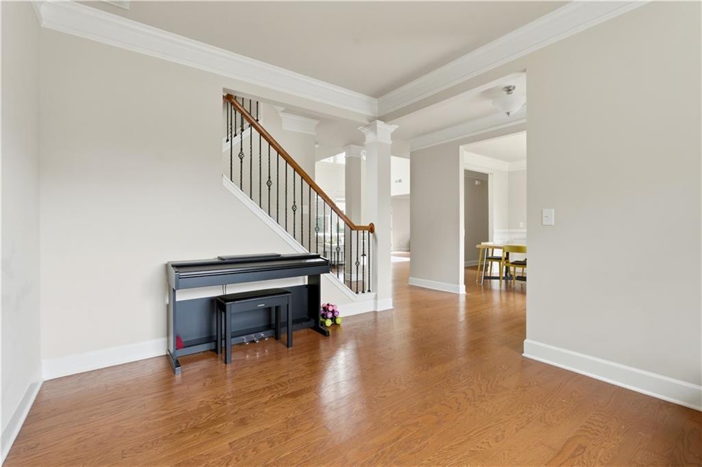 2572 Larson Creek Way Northwest Duluth, GA 30097 - Photo 15 of 50 a view of entryway and hall with wooden floor