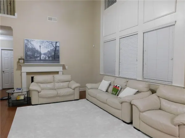 a living room with furniture and a couch