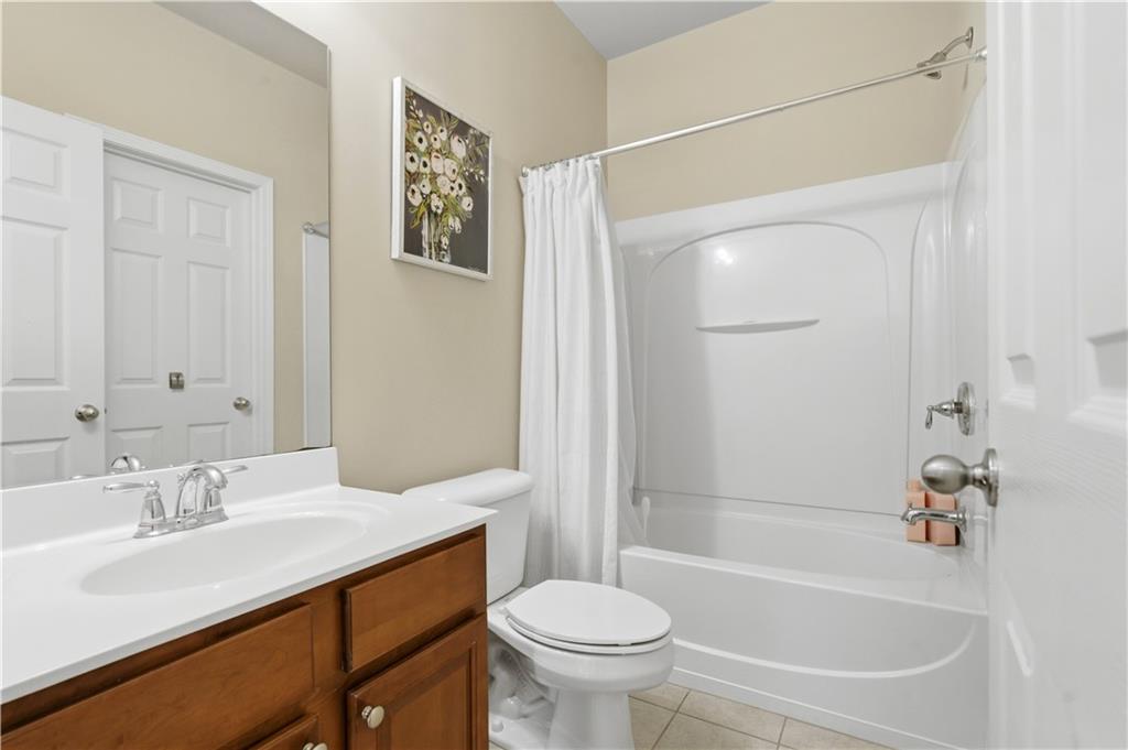 2572 Larson Creek Way Northwest Duluth, GA 30097 - Photo 26 of 50 a bathroom with a sink toilet and shower