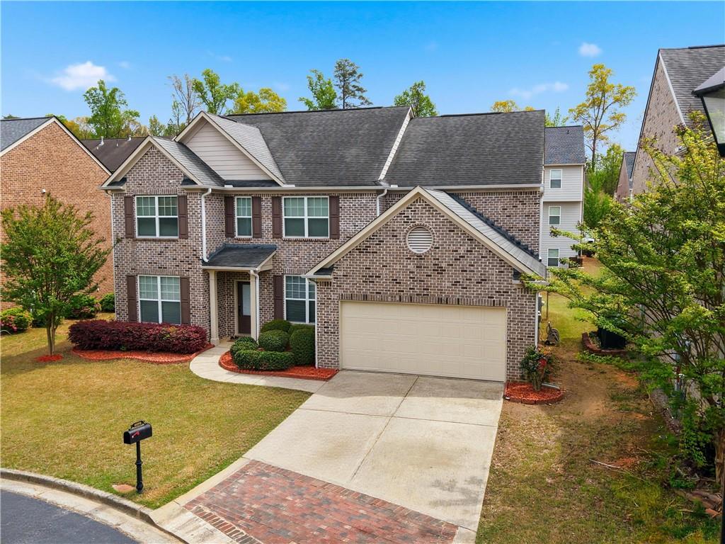 2572 Larson Creek Way Northwest Duluth, GA 30097 - Photo 3 of 50 a aerial view of a house with swimming pool