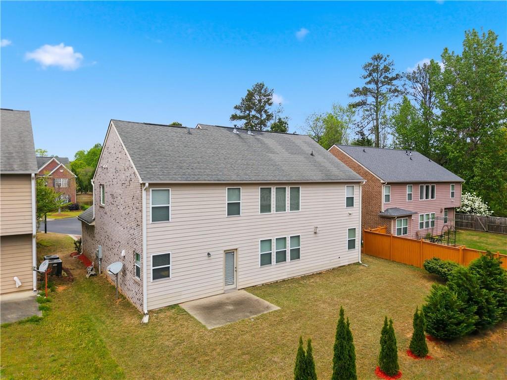 2572 Larson Creek Way Northwest Duluth, GA 30097 - Photo 4 of 50 a view of a house with roof deck front of house