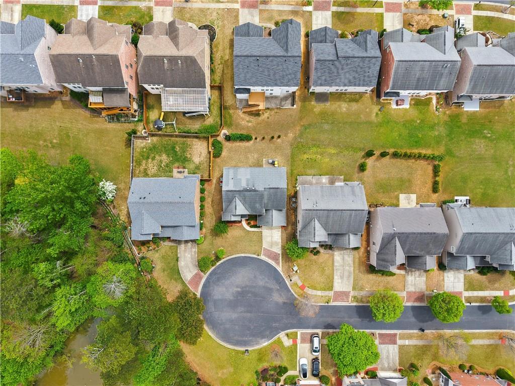 2572 Larson Creek Way Northwest Duluth, GA 30097 - Photo 7 of 50 an aerial view of residential houses with outdoor space and swimming pool