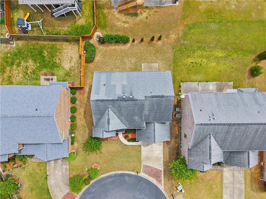 2572 Larson Creek Way Northwest Duluth, GA 30097 - Photo 8 of 50 an aerial view of residential houses with outdoor space and swimming pool