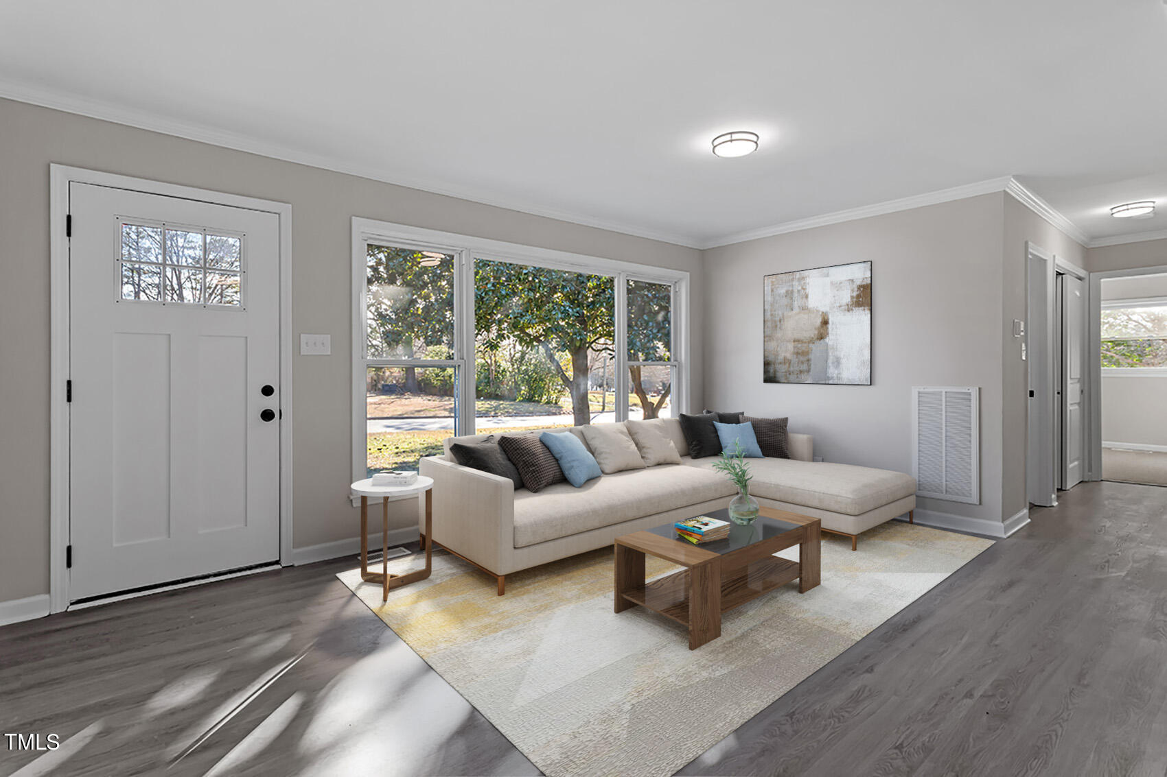 706 Friar Tuck Road Raleigh, NC 27610 - Photo 4 of 38 a living room with furniture and a window