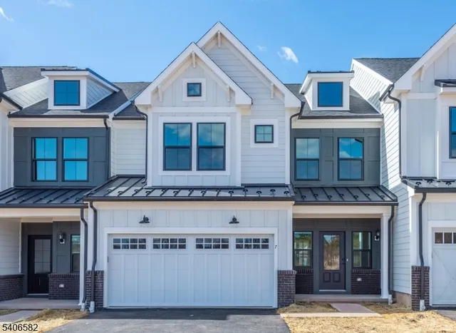 a view of a brick building with many windows