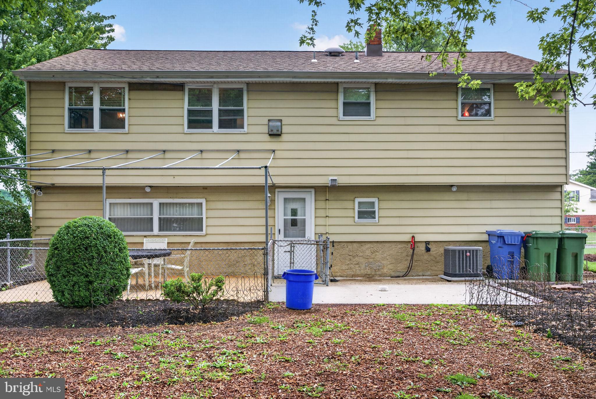 46 Trinity Avenue Marlton, NJ 08053 - Photo 33 of 37 a front view of a house with a yard and garage