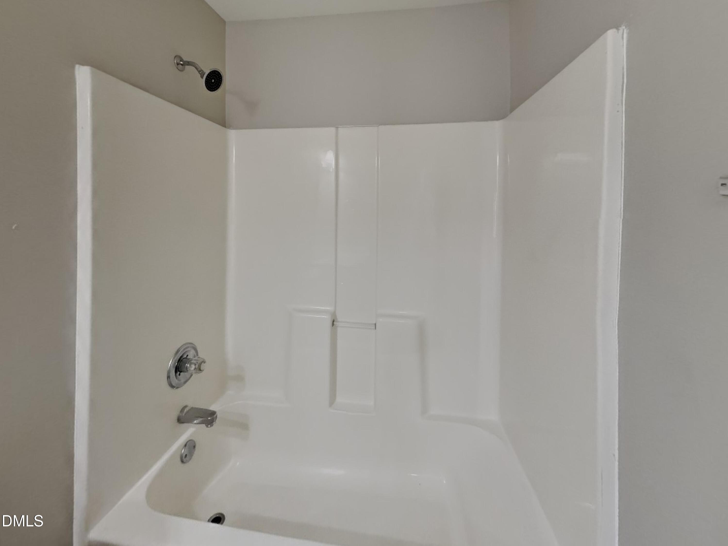 3224 Cotton Grove Raleigh, NC 27610 - Photo 14 of 15 a bathroom with a bathtub