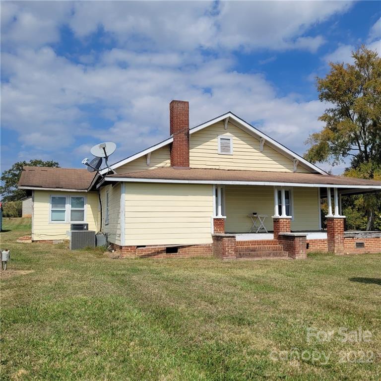 1011 Walters Road Monroe, NC 28112 - Photo 3 of 21 a front view of a house with a yard