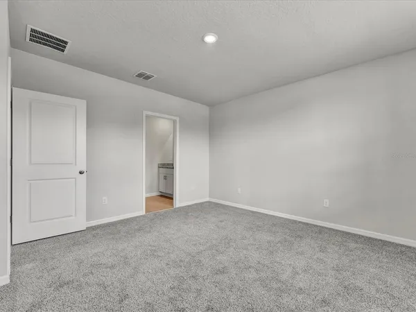 an empty room with an entryway