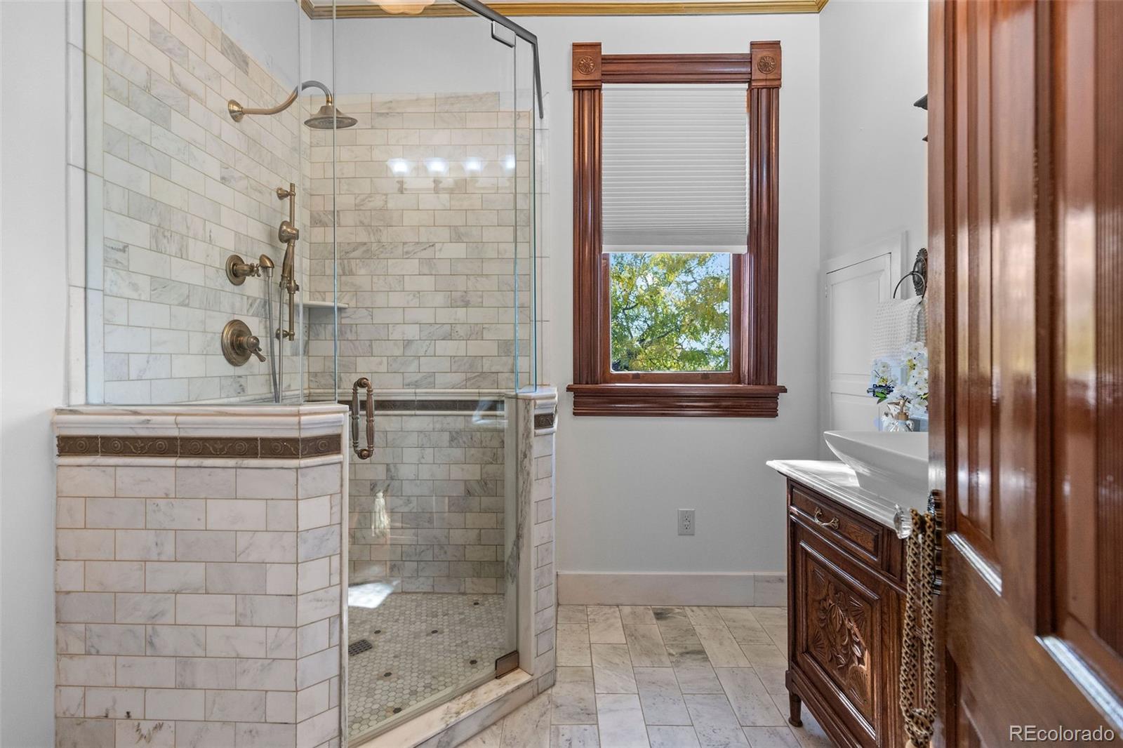 1389 Stuart Street Denver, CO 80204 - Photo 30 of 50 a bathroom with a shower