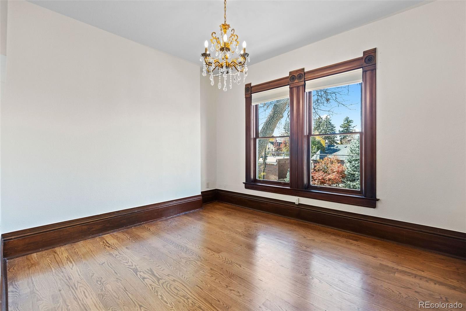 1389 Stuart Street Denver, CO 80204 - Photo 32 of 50 a view of an empty room with a window