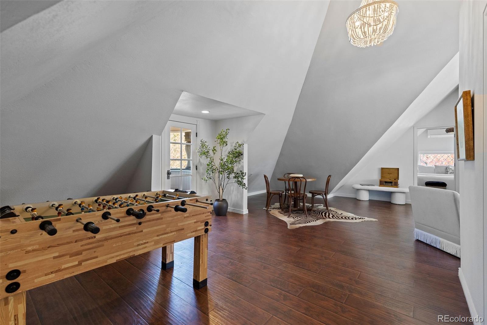 1389 Stuart Street Denver, CO 80204 - Photo 34 of 50 a dining room with furniture and wooden floor