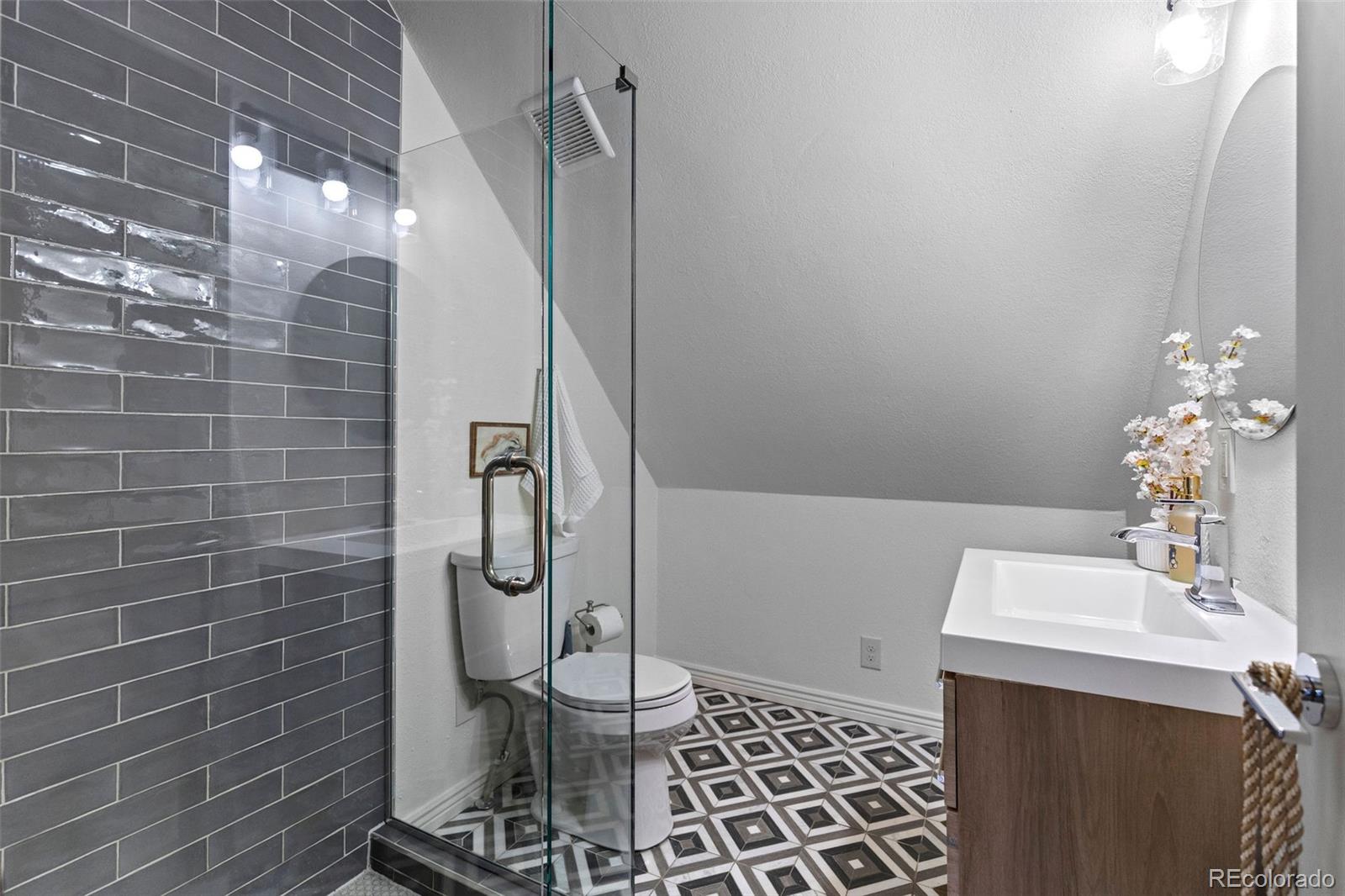 1389 Stuart Street Denver, CO 80204 - Photo 36 of 50 a bathroom with a shower