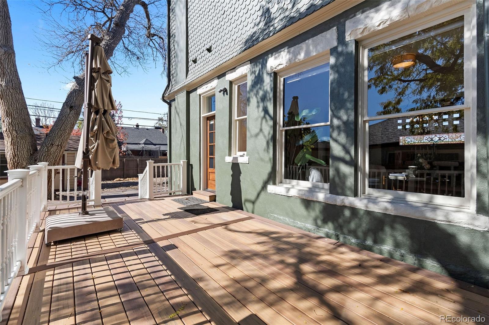 1389 Stuart Street Denver, CO 80204 - Photo 42 of 50 a view of a house with a large windows
