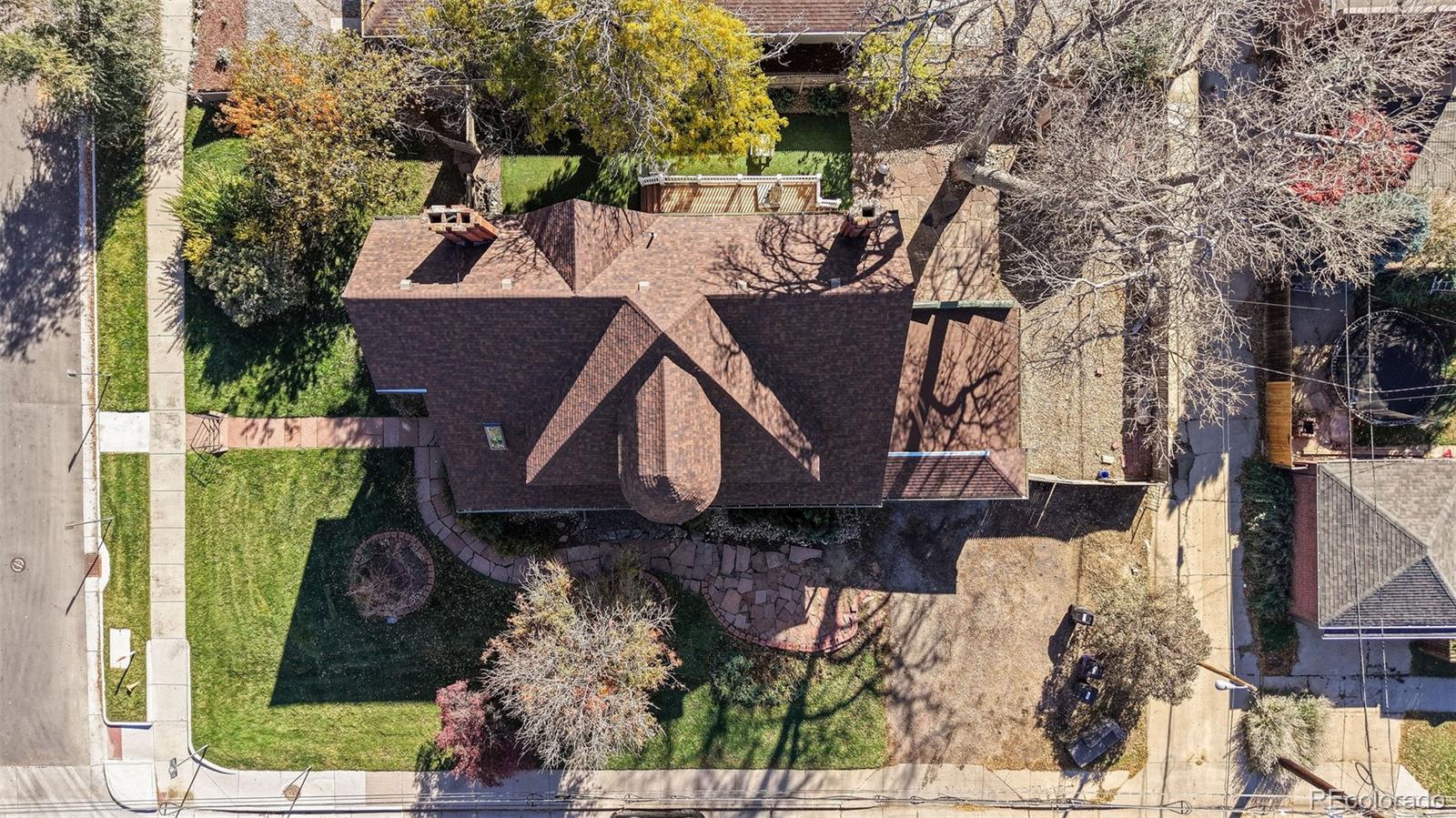 1389 Stuart Street Denver, CO 80204 - Photo 45 of 50 a view of a house with a yard