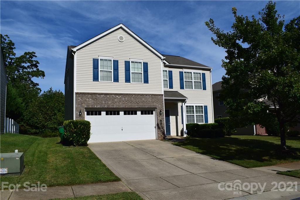 12021 Bending Branch Road Charlotte, NC 28227 - Photo 2 of 16 a front view of a house with a yard