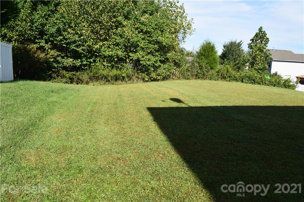 12021 Bending Branch Road Charlotte, NC 28227 - Photo 16 of 16 a view of a field with an trees