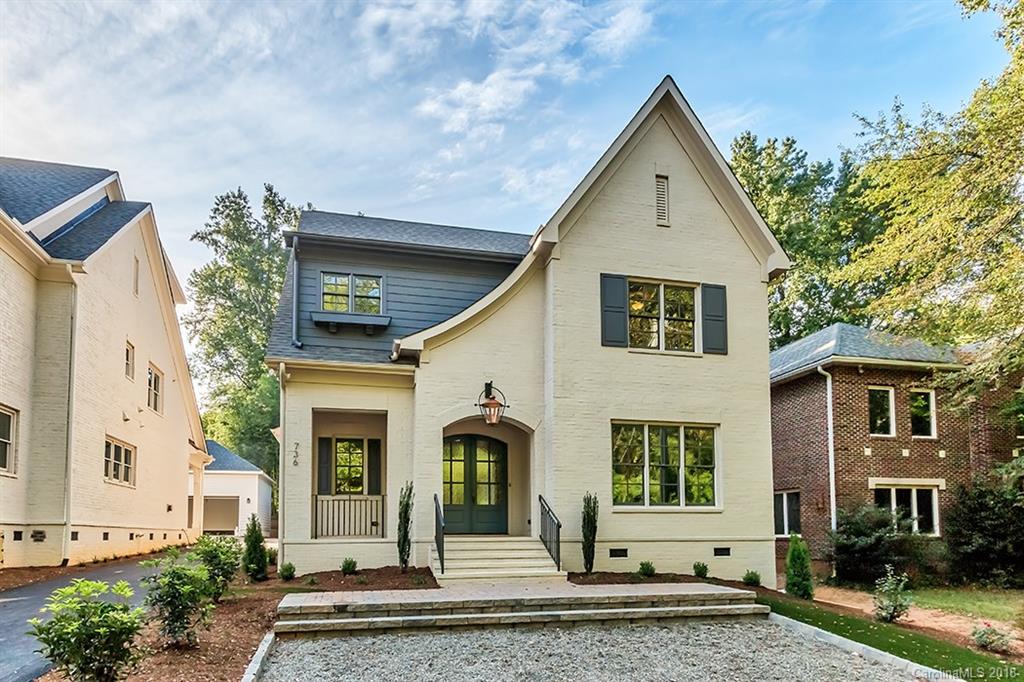 736 Ellsworth Road, Unit 44 Charlotte, NC 28211 - Photo 1 of 36 a front view of a house with a yard