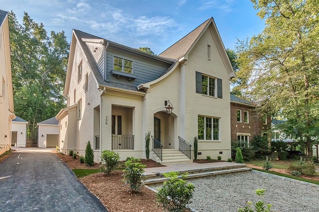 736 Ellsworth Road, Unit 44 Charlotte, NC 28211 - Photo 2 of 36 a front view of a house with garden