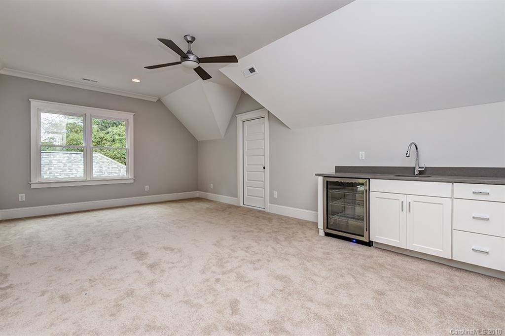 736 Ellsworth Road, Unit 44 Charlotte, NC 28211 - Photo 29 of 36 a view of a kitchen with sink cabinets and window