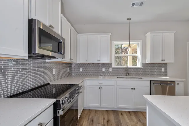 a view of small space with wooden floor