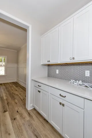 a bathroom with a sink double vanity and a mirror