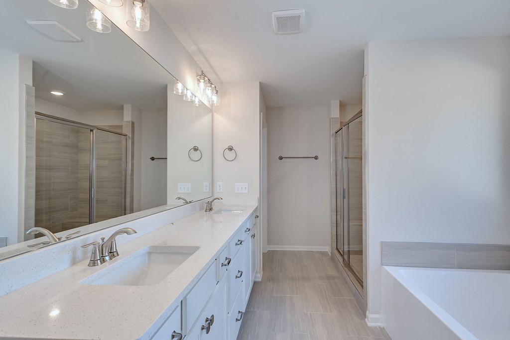 8701 McKee Road Upatoi, GA 31829 - Photo 22 of 35 a spacious bathroom with a double vanity sink mirror and double