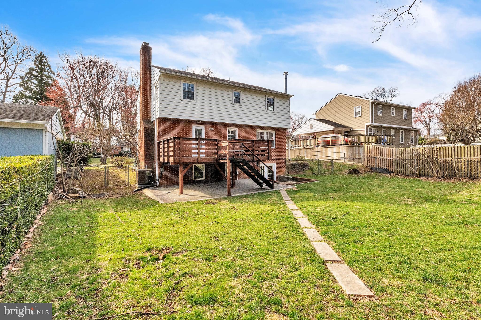 13410 Tamarack Road Silver Spring, MD 20904 - Photo 3 of 28 a view of a house with a big yard and sitting area